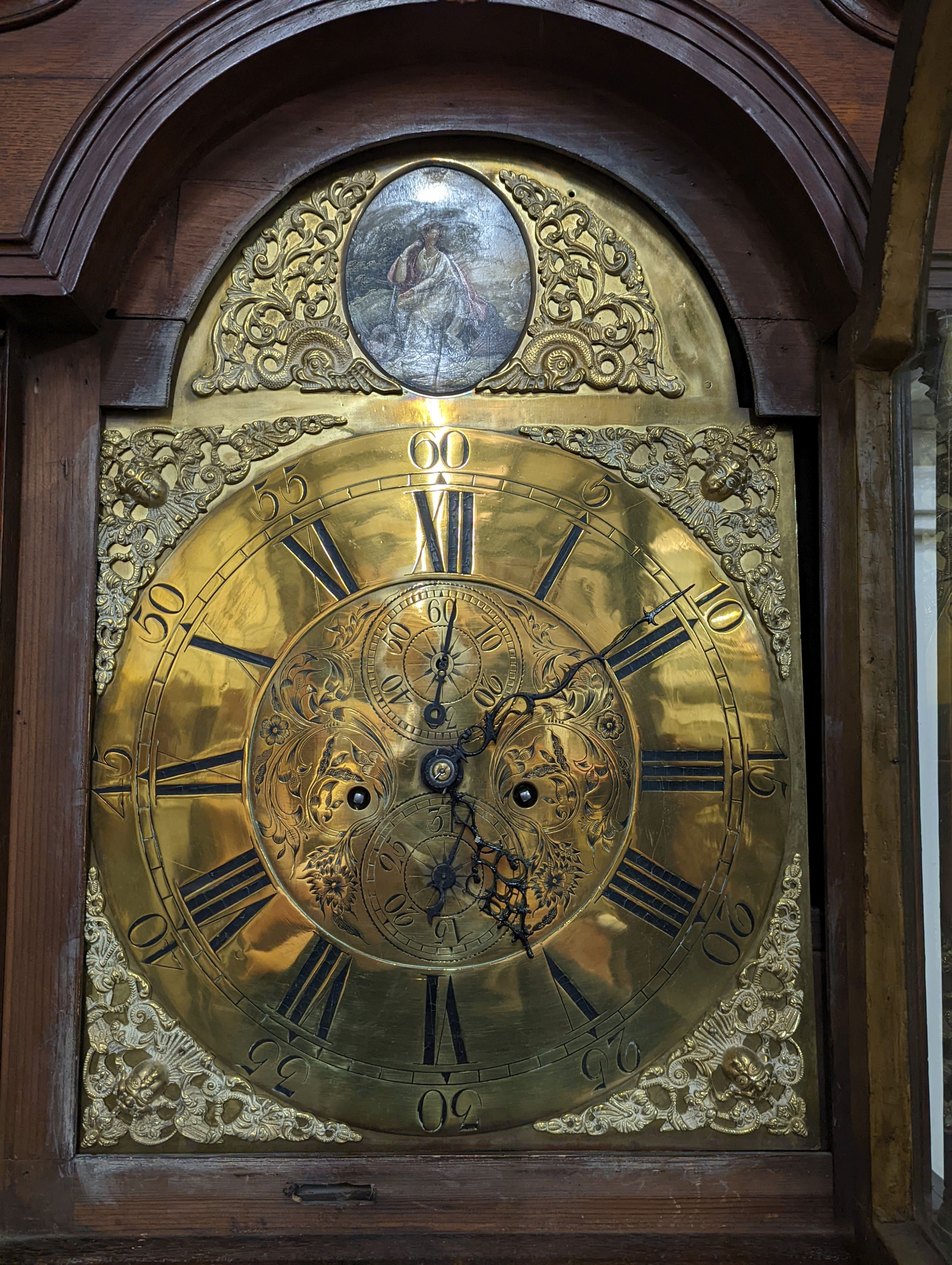 A George III oak cased 8 day longcase clock, height 237cm